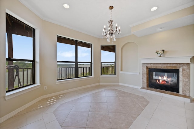 303 Winkler St, Baytown, TX 77520 - unfurnished living room with tile patterned floors, plenty of natural light, baseboards, recessed lighting, and crown molding
