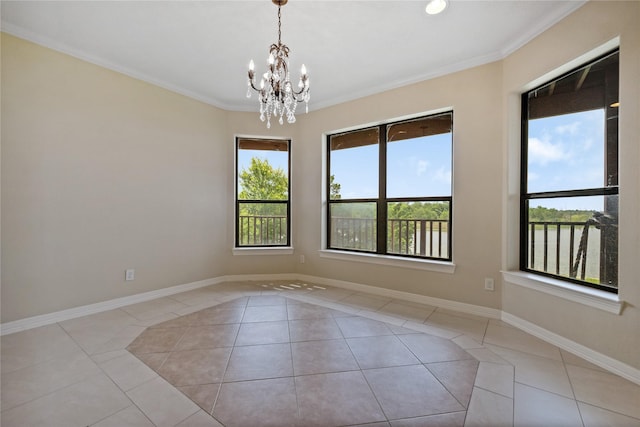 303 Winkler St, Baytown, TX 77520 - spare room with light tile patterned flooring, a chandelier, ornamental molding, baseboards, and recessed lighting