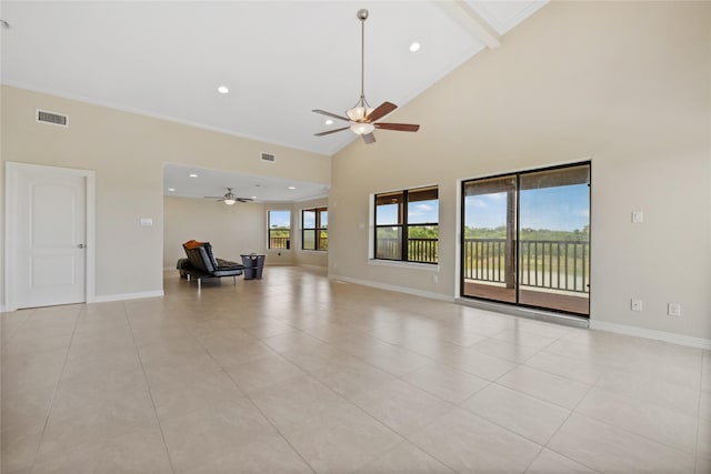 303 Winkler St, Baytown, TX 77520 - unfurnished living room featuring ceiling fan, baseboards, recessed lighting, high vaulted ceiling, and light tile patterned floors