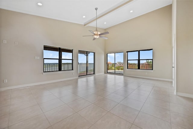 303 Winkler St, Baytown, TX 77520 - empty room featuring light tile patterned flooring, baseboards, beamed ceiling, a ceiling fan, and ornamental molding
