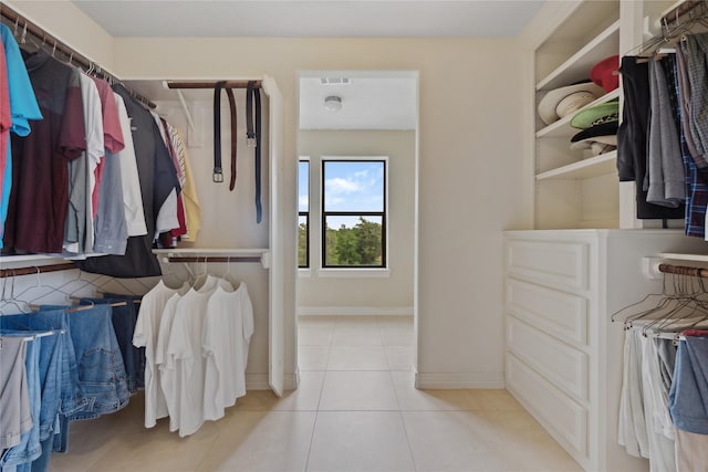 303 Winkler St, Baytown, TX 77520 - walk in closet featuring tile patterned floors