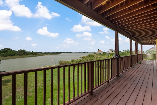 303 Winkler St, Baytown, TX 77520 - wooden terrace with a water view and a yard