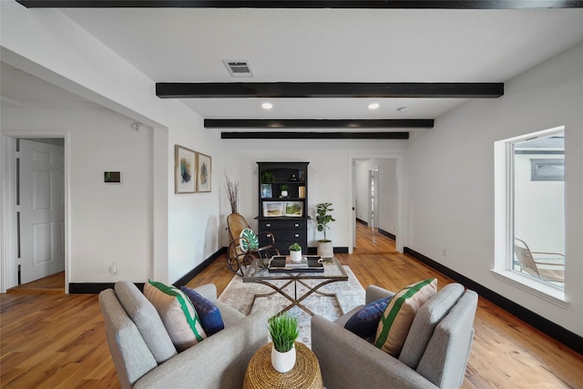 701 W 39th St, Houston, TX 77018 - living area with baseboards, light wood-style floors, recessed lighting, and beamed ceiling