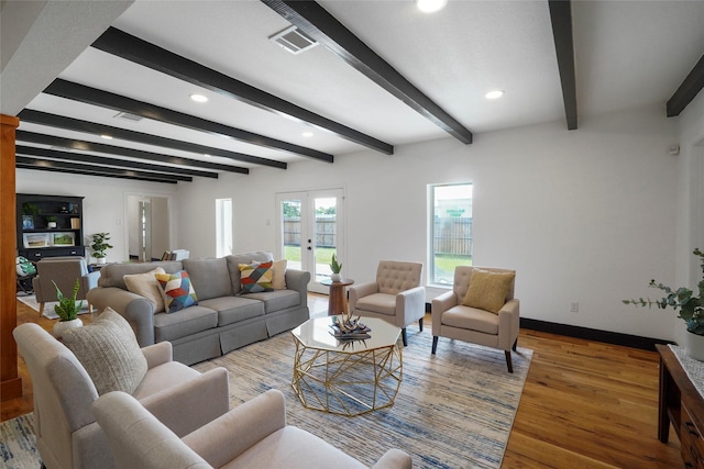 701 W 39th St, Houston, TX 77018 - living room featuring wood finished floors, baseboards, beamed ceiling, recessed lighting, and french doors