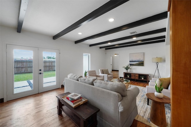 701 W 39th St, Houston, TX 77018 - living room featuring wood finished floors, beam ceiling, french doors, and recessed lighting