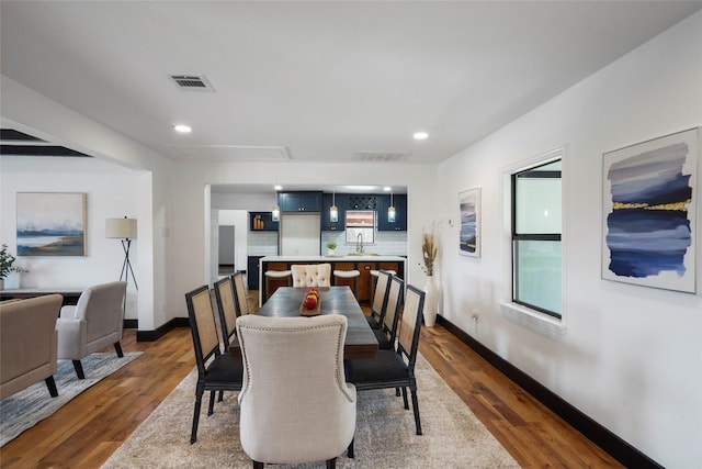 701 W 39th St, Houston, TX 77018 - dining space with attic access, baseboards, dark wood-style floors, and recessed lighting