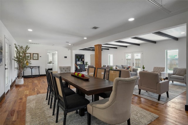 701 W 39th St, Houston, TX 77018 - dining space with ornate columns, recessed lighting, beam ceiling, wood finished floors, and french doors