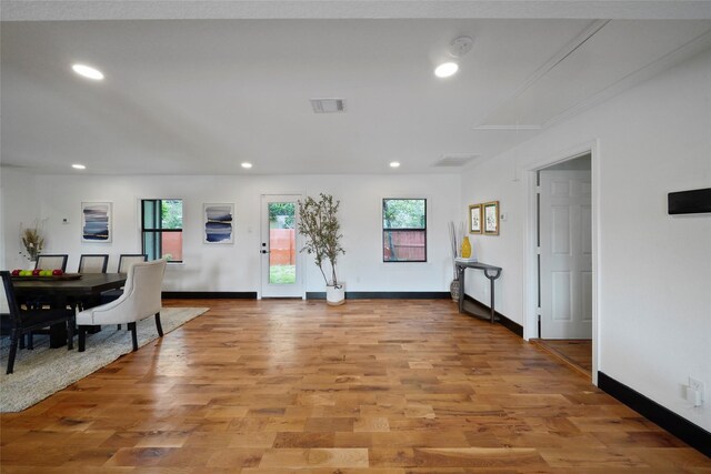 701 W 39th St, Houston, TX 77018 - dining area featuring recessed lighting, light wood-type flooring, and baseboards