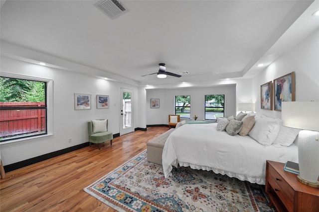 701 W 39th St, Houston, TX 77018 - bedroom featuring wood finished floors, recessed lighting, baseboards, and a ceiling fan