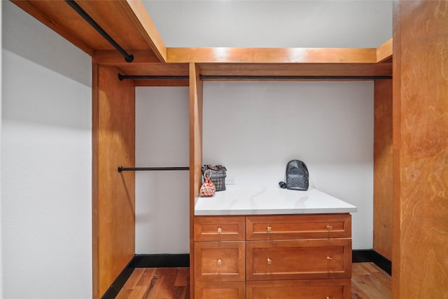 701 W 39th St, Houston, TX 77018 - walk in closet featuring wood finished floors