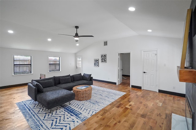 701 W 39th St, Houston, TX 77018 - living area featuring vaulted ceiling, wood finished floors, ceiling fan, baseboards, and recessed lighting