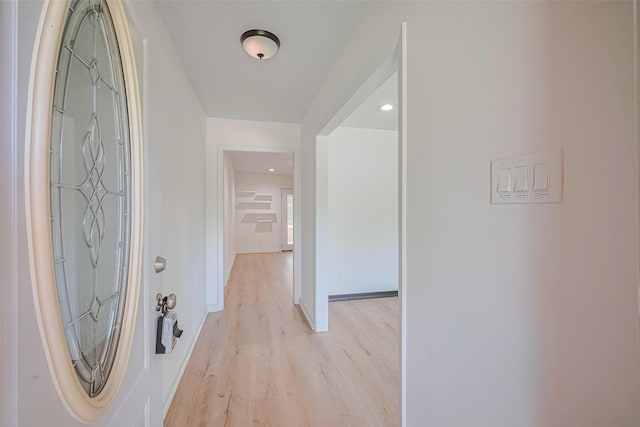12206 Ashcroft Dr, Houston, TX 77035 - entryway with light wood-style floors and baseboards