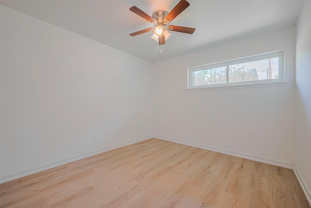 12206 Ashcroft Dr, Houston, TX 77035 - spare room with light wood-style floors, baseboards, and a ceiling fan