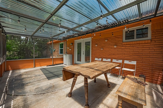 12206 Ashcroft Dr, Houston, TX 77035 - view of patio featuring french doors and outdoor dining space