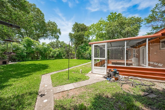 12206 Ashcroft Dr, Houston, TX 77035 - view of grassy yard featuring a sunroom