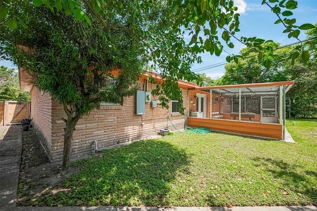 12206 Ashcroft Dr, Houston, TX 77035 - view of yard featuring a sunroom