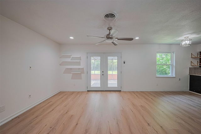 12206 Ashcroft Dr, Houston, TX 77035 - unfurnished living room with light wood-type flooring, baseboards, a ceiling fan, and recessed lighting