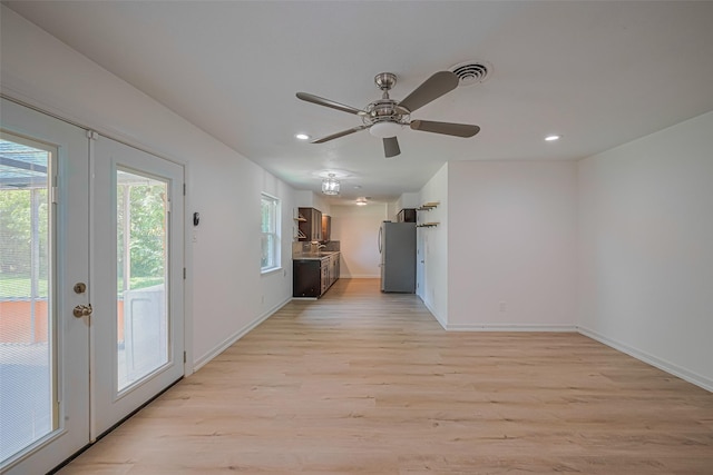 12206 Ashcroft Dr, Houston, TX 77035 - unfurnished living room featuring light wood-style floors, recessed lighting, baseboards, and ceiling fan