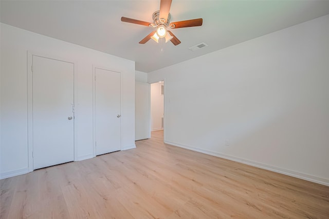 12206 Ashcroft Dr, Houston, TX 77035 - unfurnished bedroom featuring light wood-style floors and baseboards
