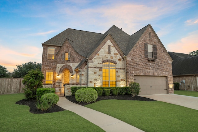 4215 Orchard Arbor Ln, Sugar Land, TX 77479 - view of front of home featuring concrete driveway, a garage, stone siding, brick siding, and a shingled roof