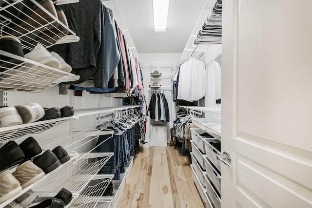 16802 Cherokee Lake Ln, Houston, TX 77044 - spacious closet featuring wood finished floors