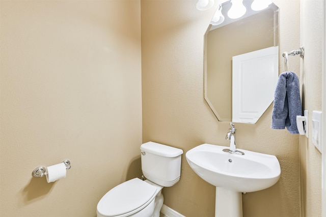 16802 Cherokee Lake Ln, Houston, TX 77044 - bathroom featuring toilet and a sink