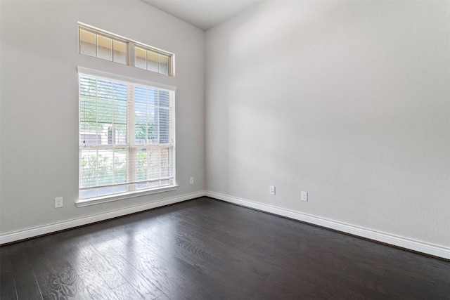4926 Thunder Creek Ln, Sugar Land, TX 77479 - empty room featuring dark wood-type flooring and baseboards