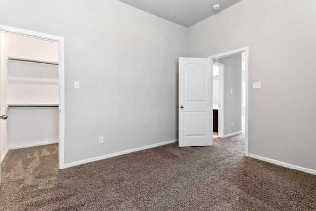 4926 Thunder Creek Ln, Sugar Land, TX 77479 - unfurnished bedroom with carpet, a spacious closet, and baseboards