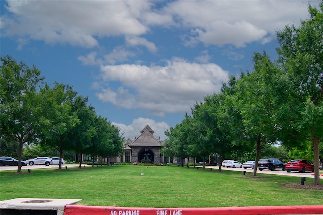 4926 Thunder Creek Ln, Sugar Land, TX 77479 - view of property's community with uncovered parking and a yard