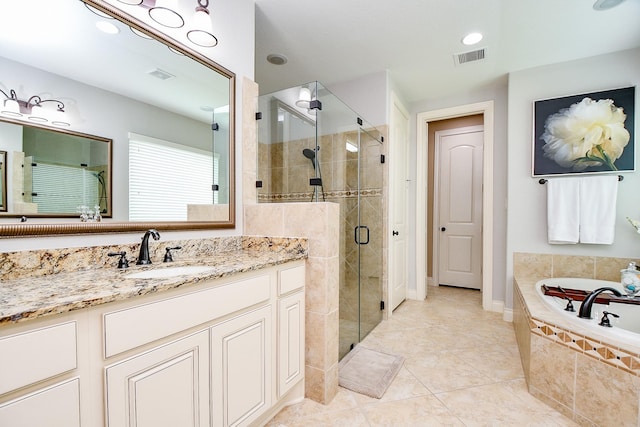 29016 Concan Crossing Ct, Katy, TX 77494 - bathroom with vanity, a bath, a shower stall, and tile patterned floors