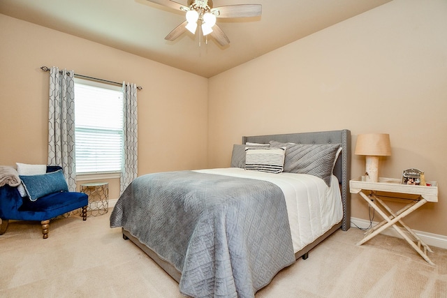 29016 Concan Crossing Ct, Katy, TX 77494 - bedroom with light carpet, baseboards, and a ceiling fan