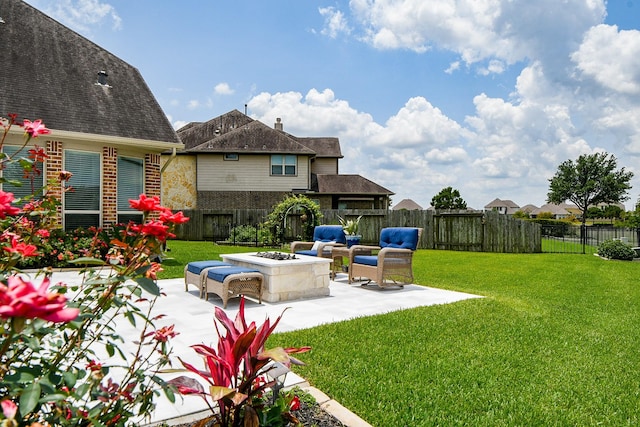 29016 Concan Crossing Ct, Katy, TX 77494 - view of yard featuring a patio area and an outdoor fire pit