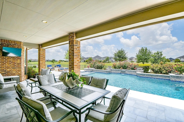 29016 Concan Crossing Ct, Katy, TX 77494 - view of patio / terrace featuring outdoor dining area and an outdoor pool