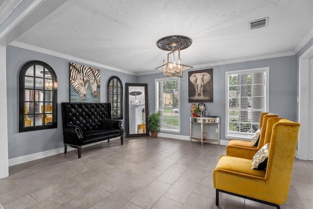 1406 Grand Valley Dr, Houston, TX 77090 - sitting room featuring baseboards, a chandelier, a textured ceiling, and ornamental molding