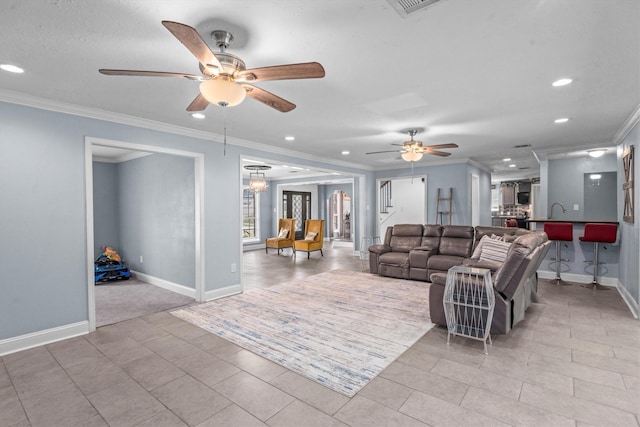 1406 Grand Valley Dr, Houston, TX 77090 - living room with a ceiling fan, ornamental molding, recessed lighting, baseboards, and tile patterned flooring