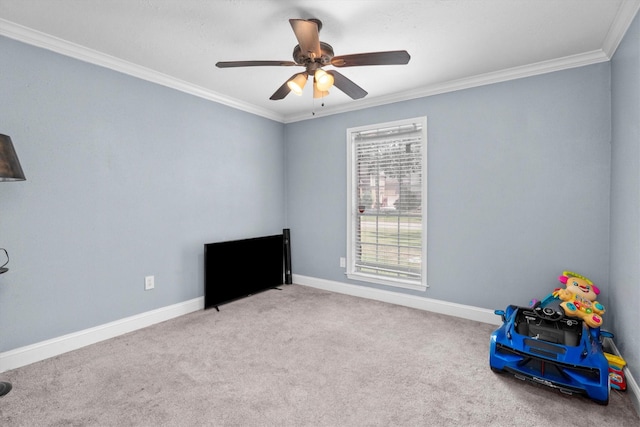 1406 Grand Valley Dr, Houston, TX 77090 - playroom featuring crown molding, a ceiling fan, baseboards, and carpet floors