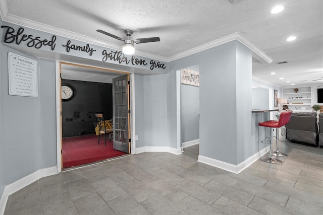 1406 Grand Valley Dr, Houston, TX 77090 - spare room with ornamental molding, baseboards, a ceiling fan, a textured ceiling, and recessed lighting
