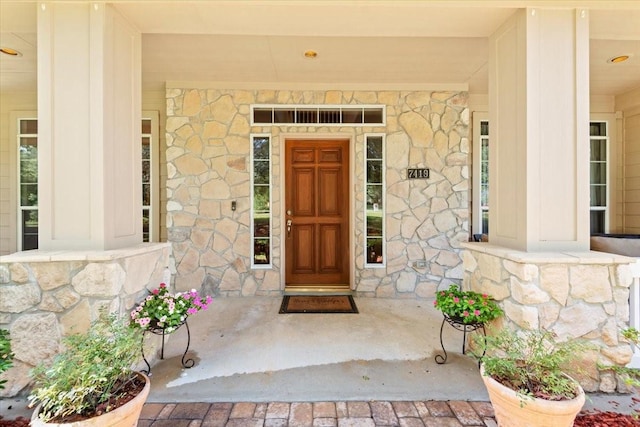 7419 Lorna Rd, Montgomery, TX 77316 - property entrance with stone siding and a porch