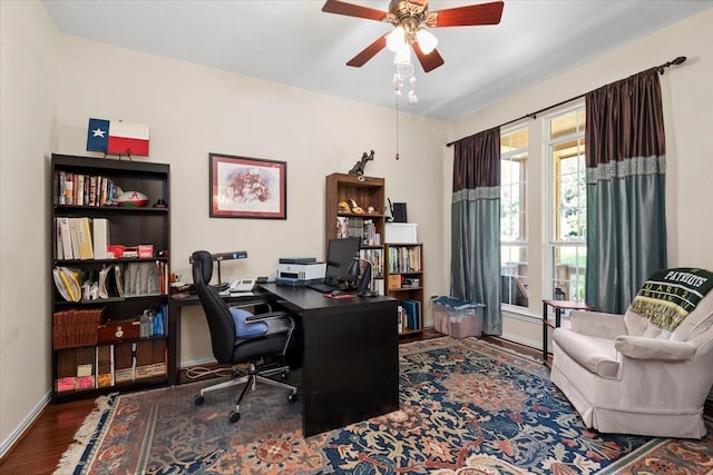 7419 Lorna Rd, Montgomery, TX 77316 - office space featuring wood finished floors, a ceiling fan, and baseboards
