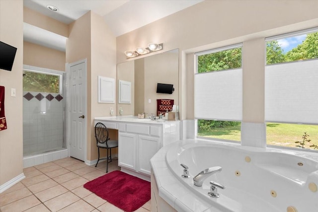 7419 Lorna Rd, Montgomery, TX 77316 - full bath with a whirlpool tub, vanity, tile patterned floors, a stall shower, and baseboards