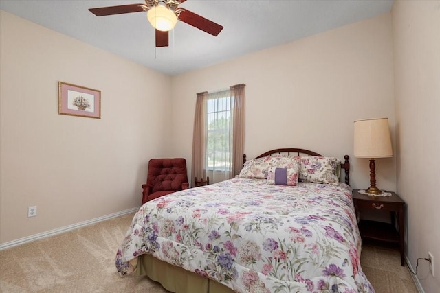 7419 Lorna Rd, Montgomery, TX 77316 - bedroom featuring carpet, baseboards, and a ceiling fan