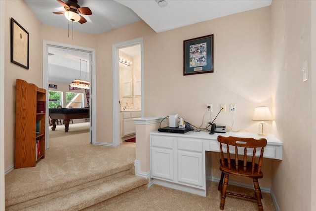 7419 Lorna Rd, Montgomery, TX 77316 - office area with light colored carpet, ceiling fan, baseboards, and built in study area