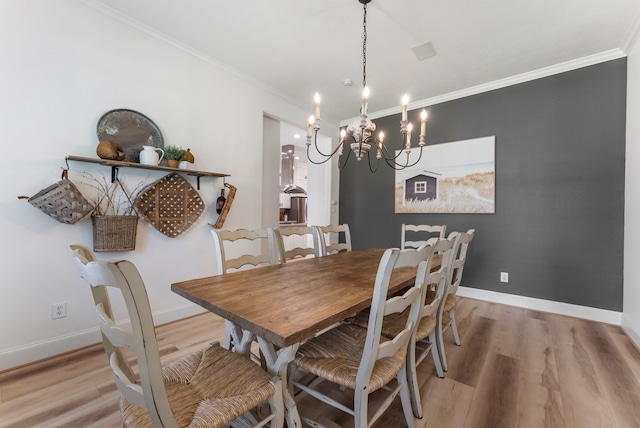 3714 Falun Ct, Spring, TX 77386 - dining space featuring a chandelier, light wood-type flooring, ornamental molding, and baseboards