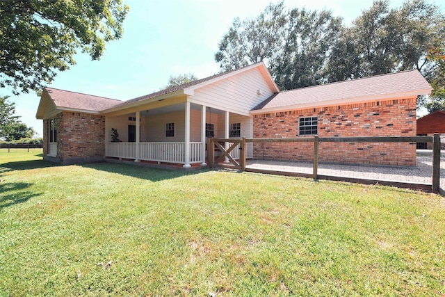 22035 Buescher Rd, Tomball, TX 77377 - back of house with brick siding and a shingled roof