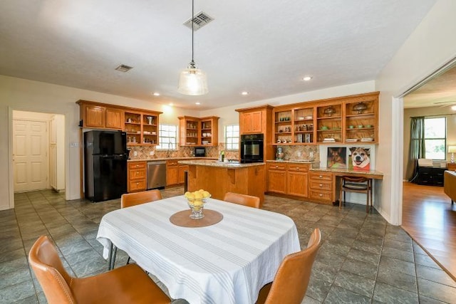 22035 Buescher Rd, Tomball, TX 77377 - dining room featuring plenty of natural light, recessed lighting, and baseboards