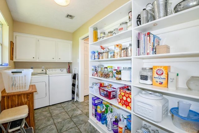 22035 Buescher Rd, Tomball, TX 77377 - laundry room featuring cabinet space and washer and dryer