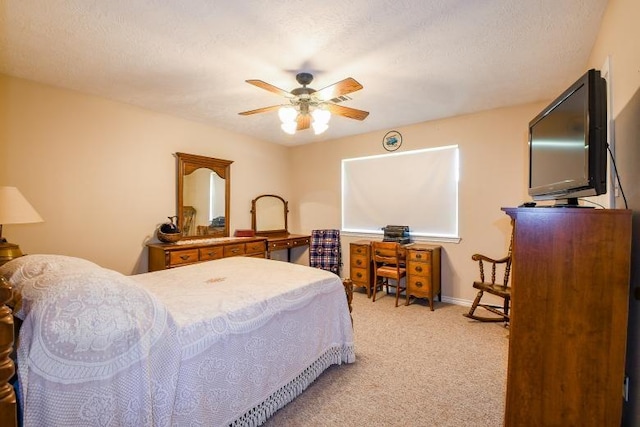 22035 Buescher Rd, Tomball, TX 77377 - bedroom with light colored carpet, ceiling fan, and baseboards