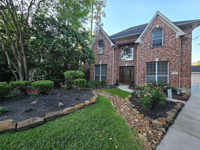 7 Newland Ct, The Woodlands, TX 77382 - view of front of house with brick siding