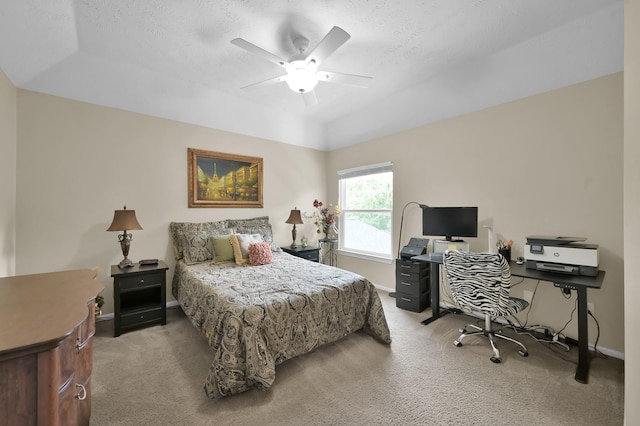 7 Newland Ct, The Woodlands, TX 77382 - bedroom with carpet flooring, an office area, baseboards, ceiling fan, and a textured ceiling