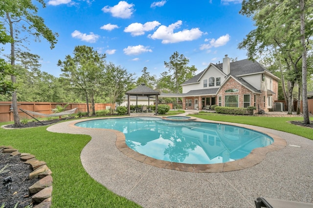 7 Newland Ct, The Woodlands, TX 77382 - view of swimming pool with a gazebo, a pool with connected hot tub, and cooling unit